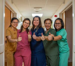 Care team at Halden Heights nursing home Ashford smiling and ready to assist residents.